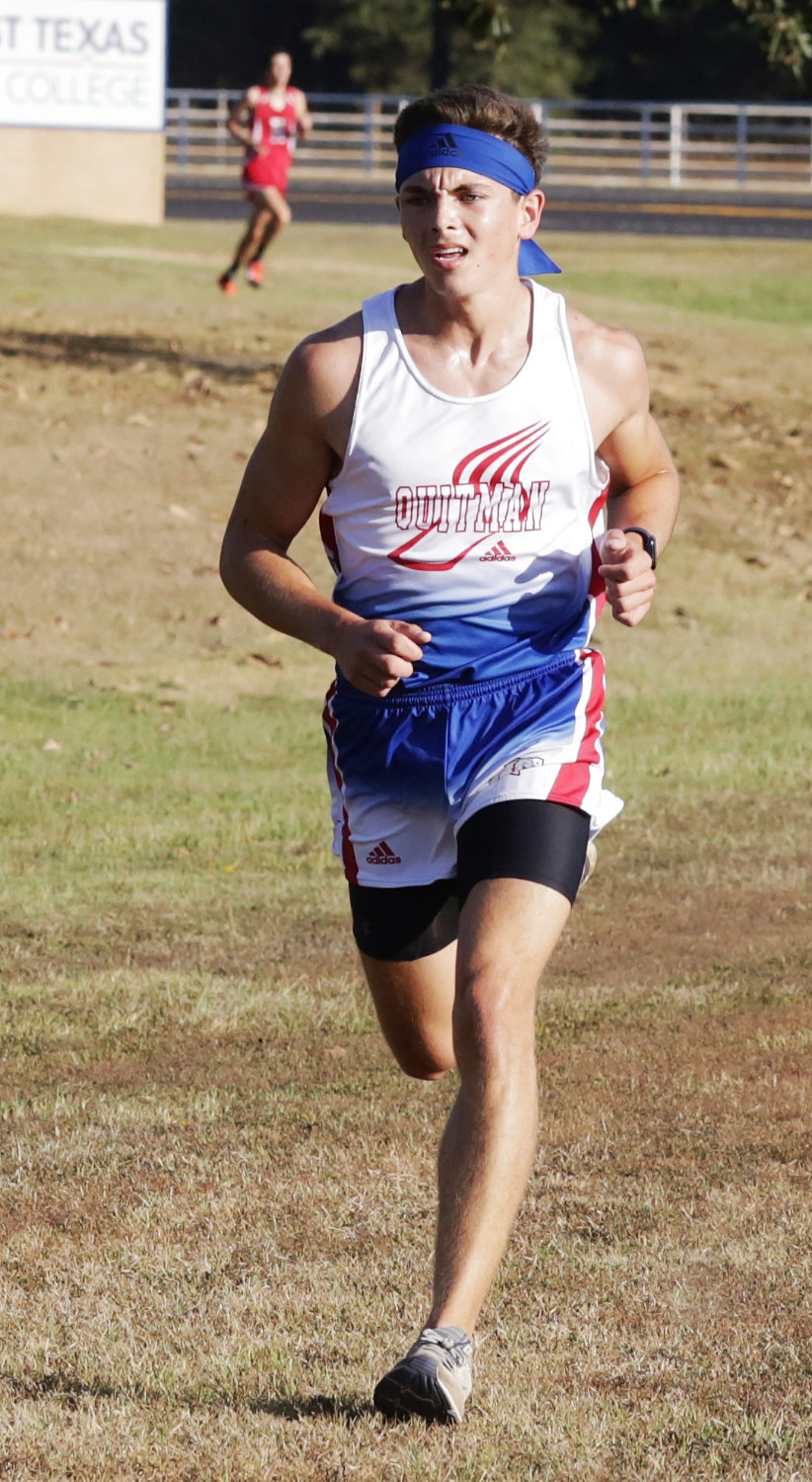 Quitman’s Brandon Jimenez was the fastest Bulldog on the day. He finished third with a time of 18:36 and led the Bulldogs to a title.